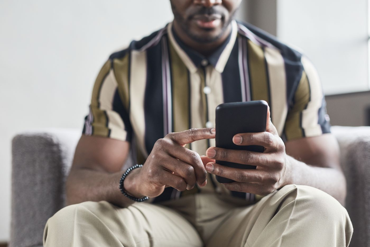 A resident using a phone at home